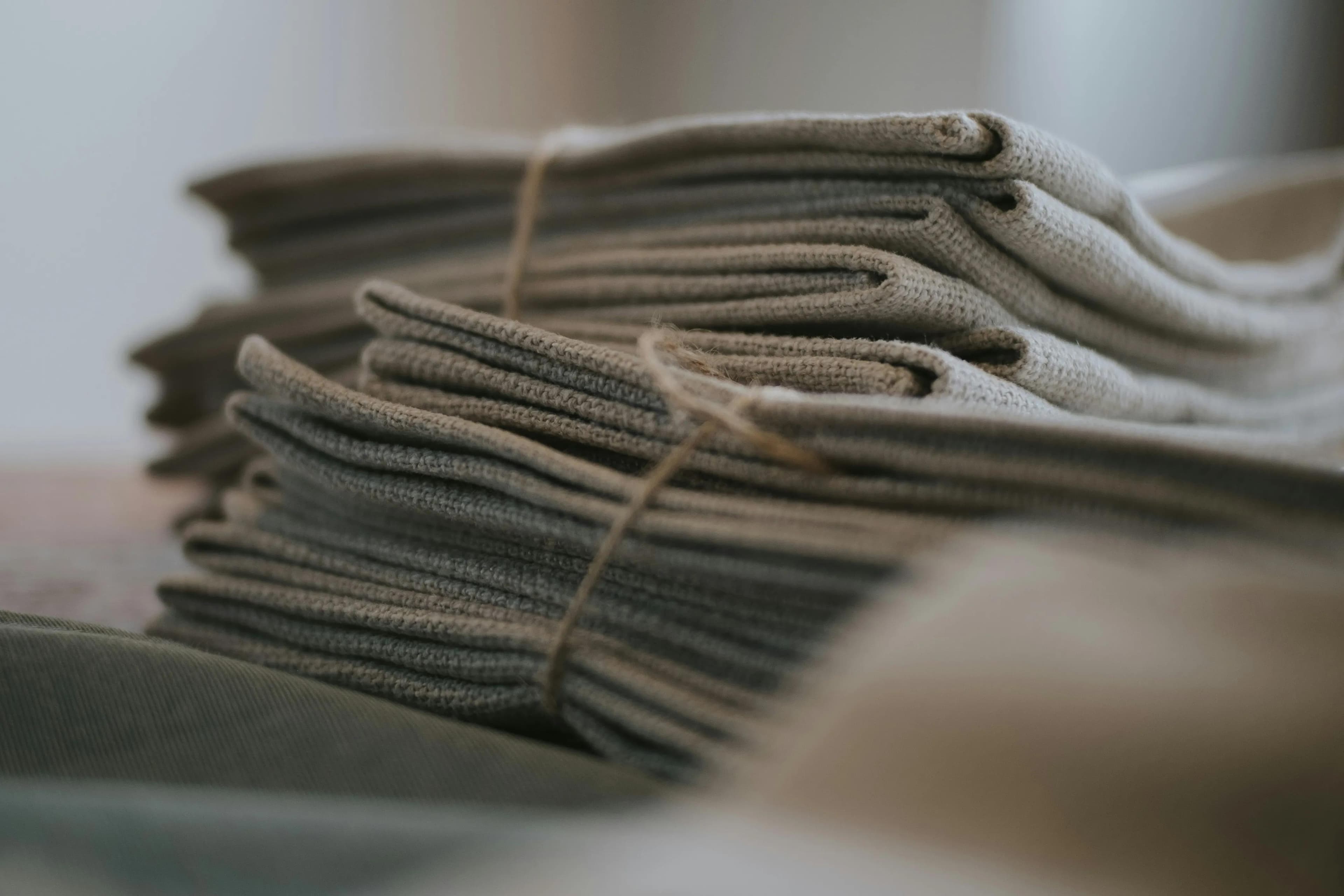 stack of fabrics on table